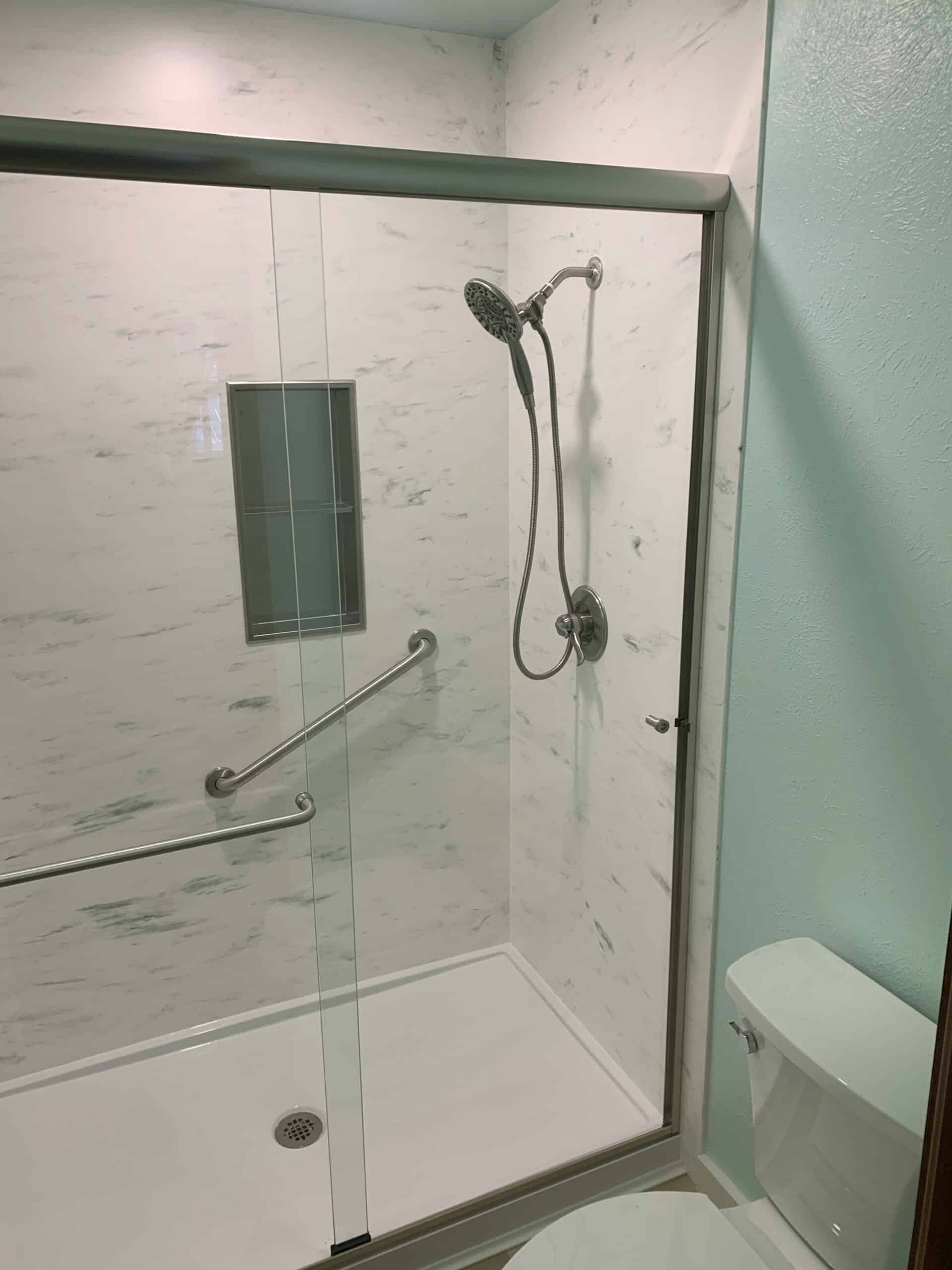 Accessible Showers in Corpus Christi, TX – Safe, Stylish, and Affordable 5 a shower with a hand shower
