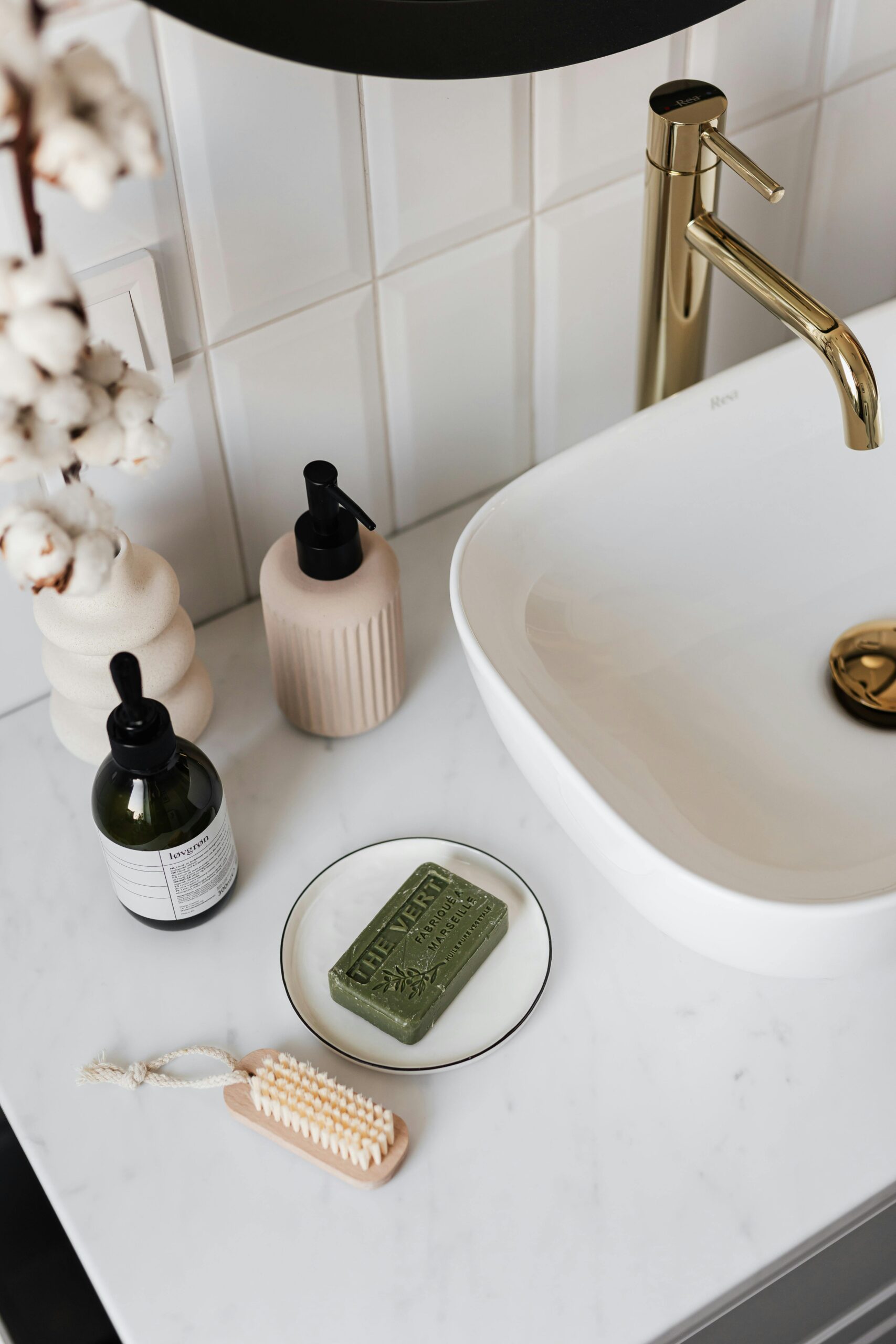 Full Bathroom Remodeling 5 a bathroom sink with soap and a brush